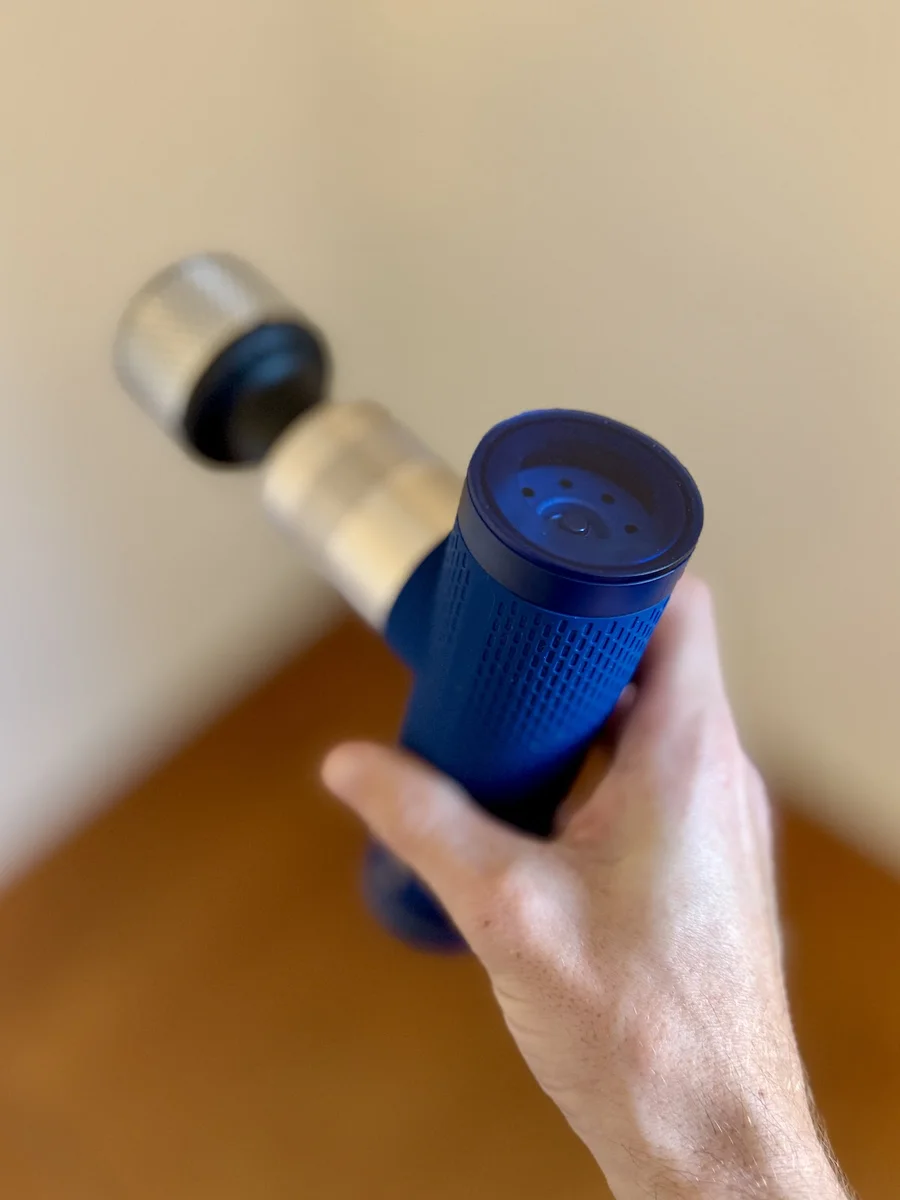 Bob & Brad A7 Pro Mini massage gun body showing textured grip and USB-C charging port detail