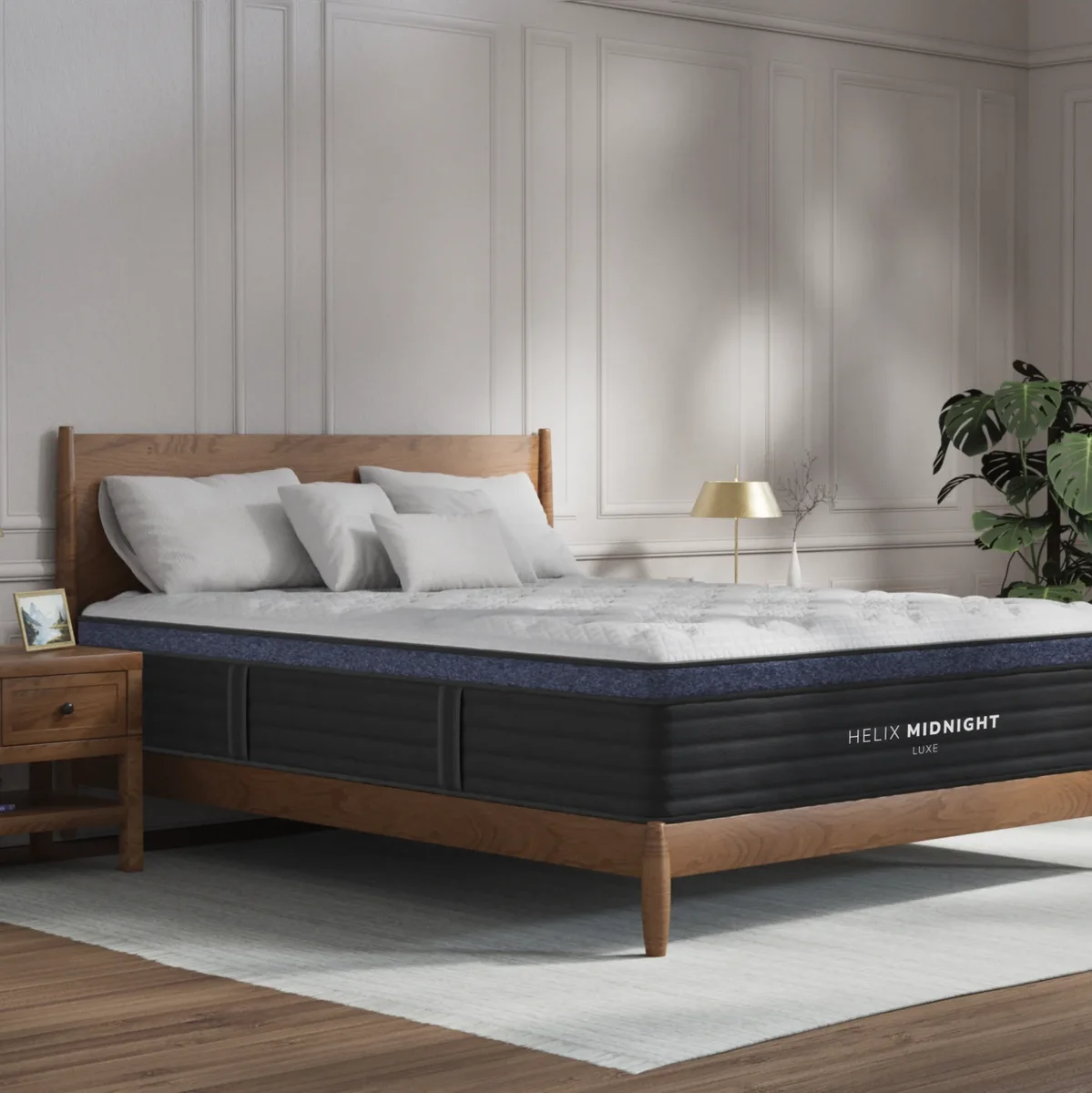 Helix Midnight Luxe 3/4 angle on wooden bed frame showing side panel and top