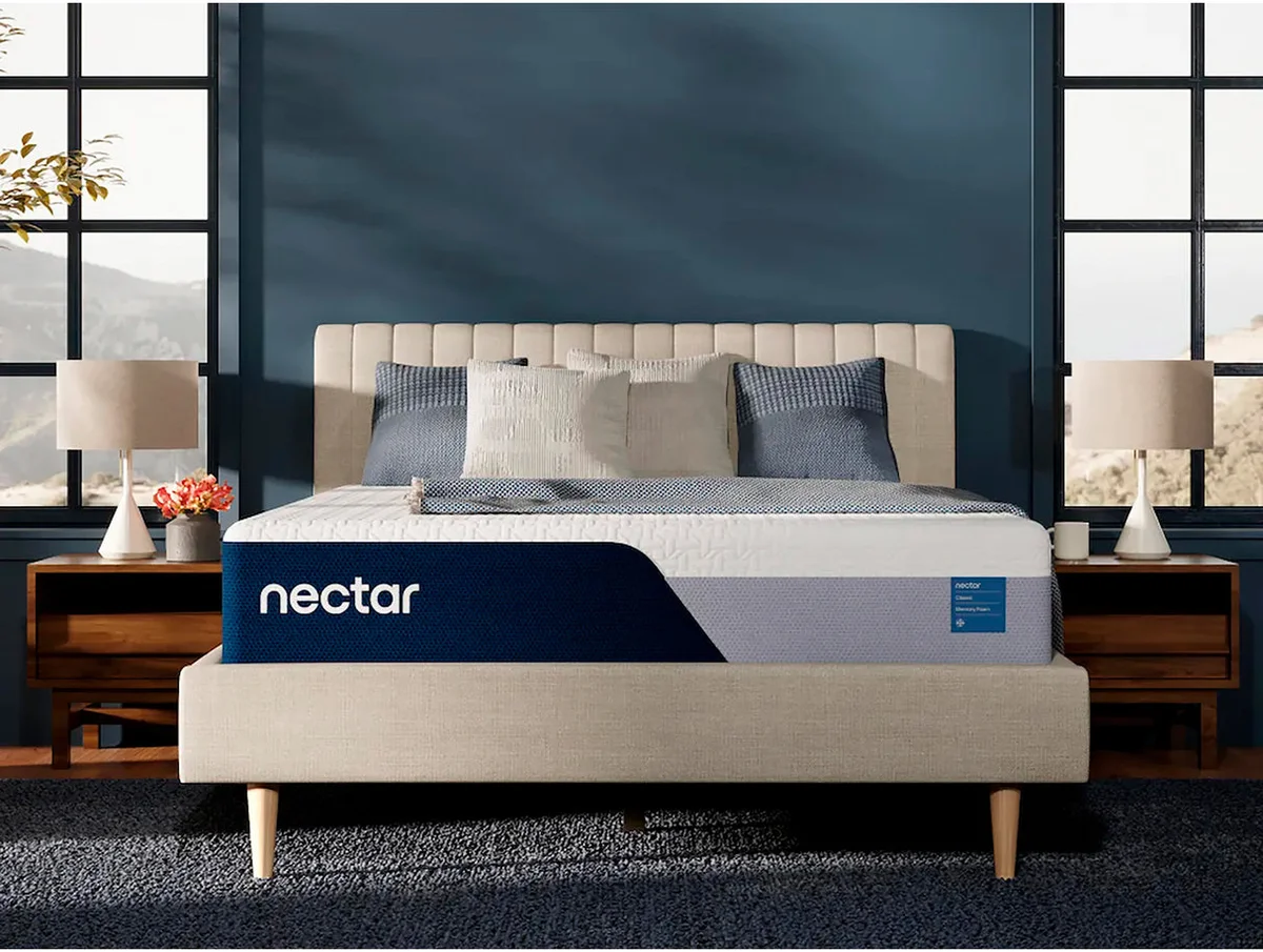 Nectar Classic mattress front-facing view in bedroom setting with brand label visible