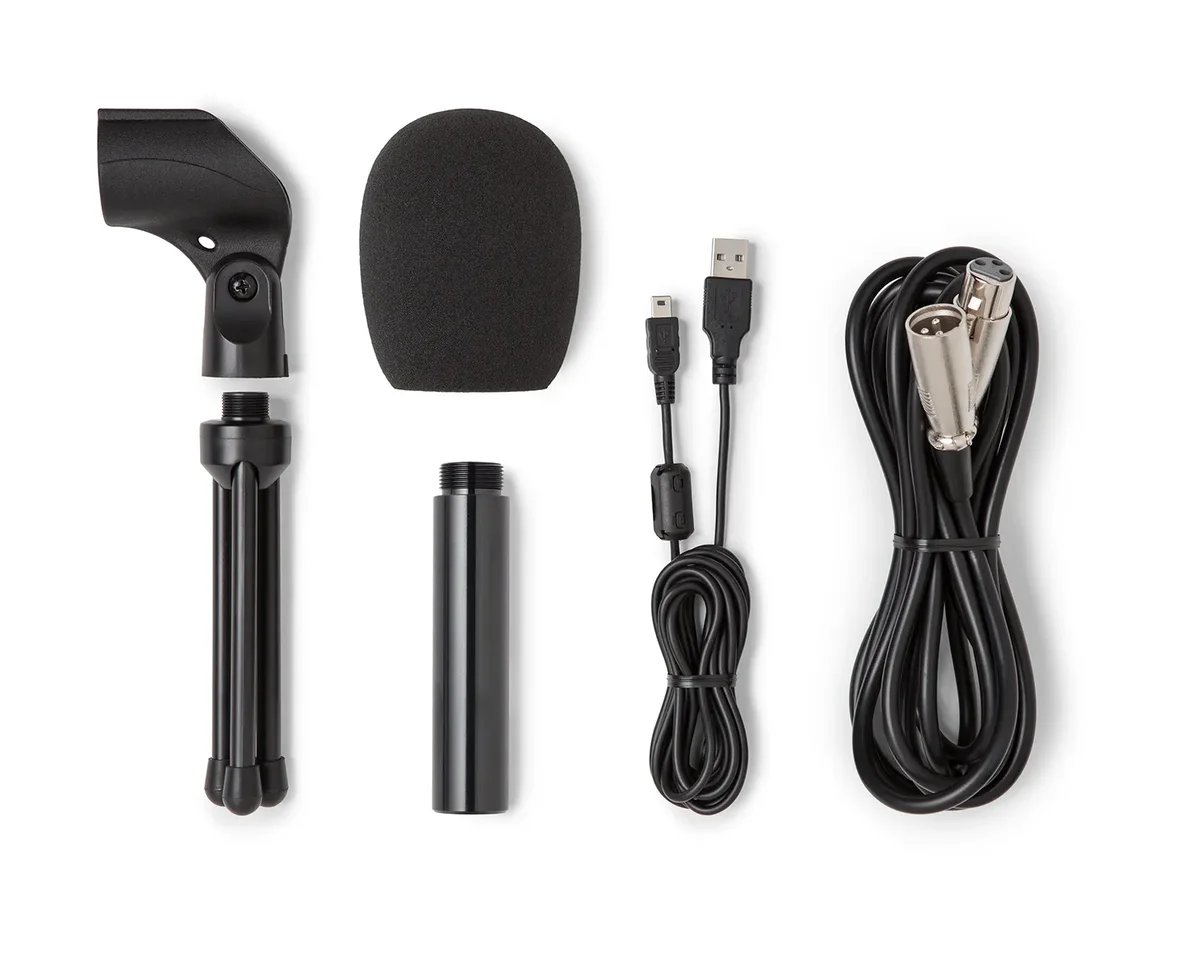 Samson Q2U accessories flat lay: desk stand, windscreen, USB cable, and XLR cable