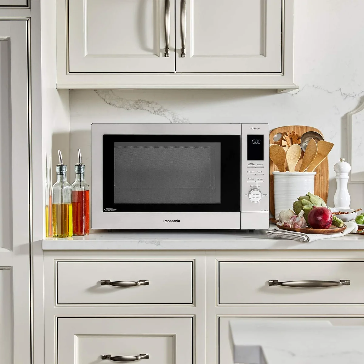 Panasonic HomeChef 4-in-1 on kitchen counter surrounded by cooking utensils and fresh vegetables