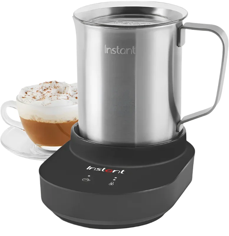 Instant MagicFroth 9-in-1 milk frother with stainless steel pitcher on its black base next to a finished latte with whipped foam and cinnamon