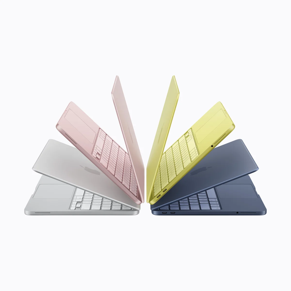 Apple MacBook Neo lineup fanned open in Silver, Blush, Citrus and Indigo