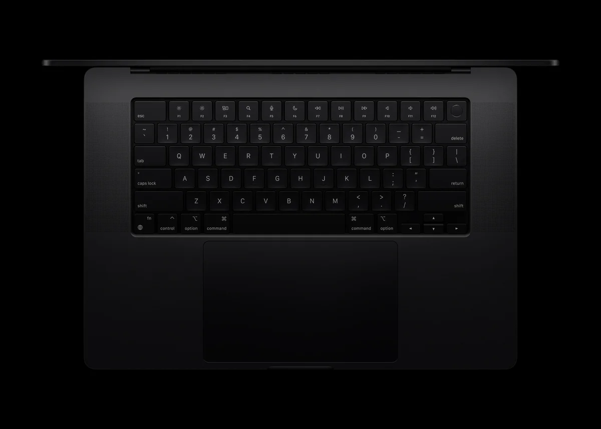 Close-up of MacBook Pro Magic Keyboard and trackpad in Space Black