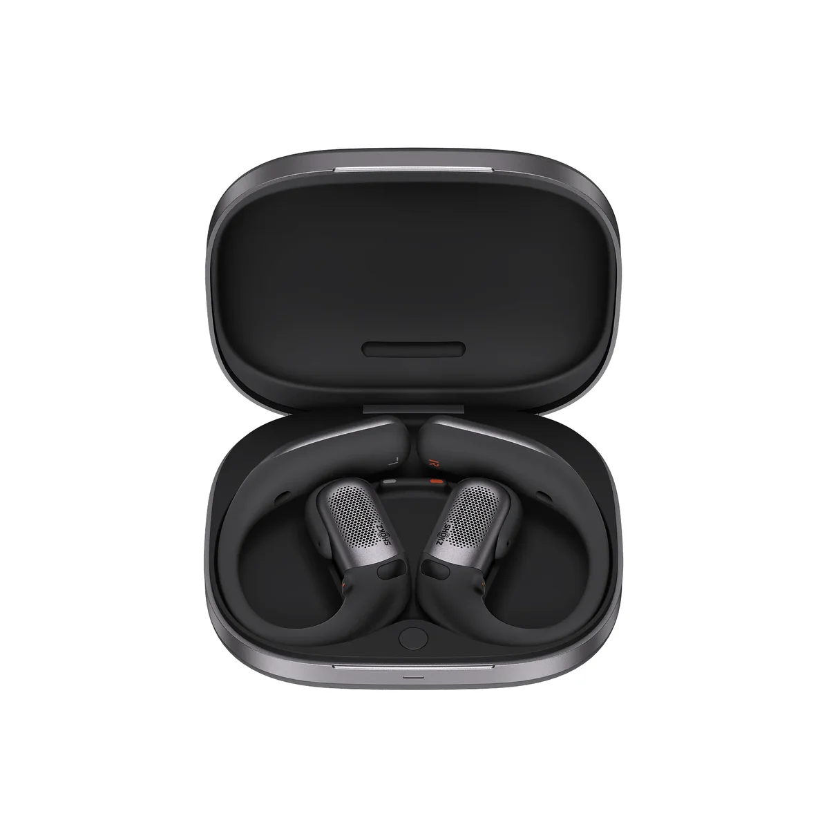 Shokz OpenFit Pro earbuds nested in their open charging case