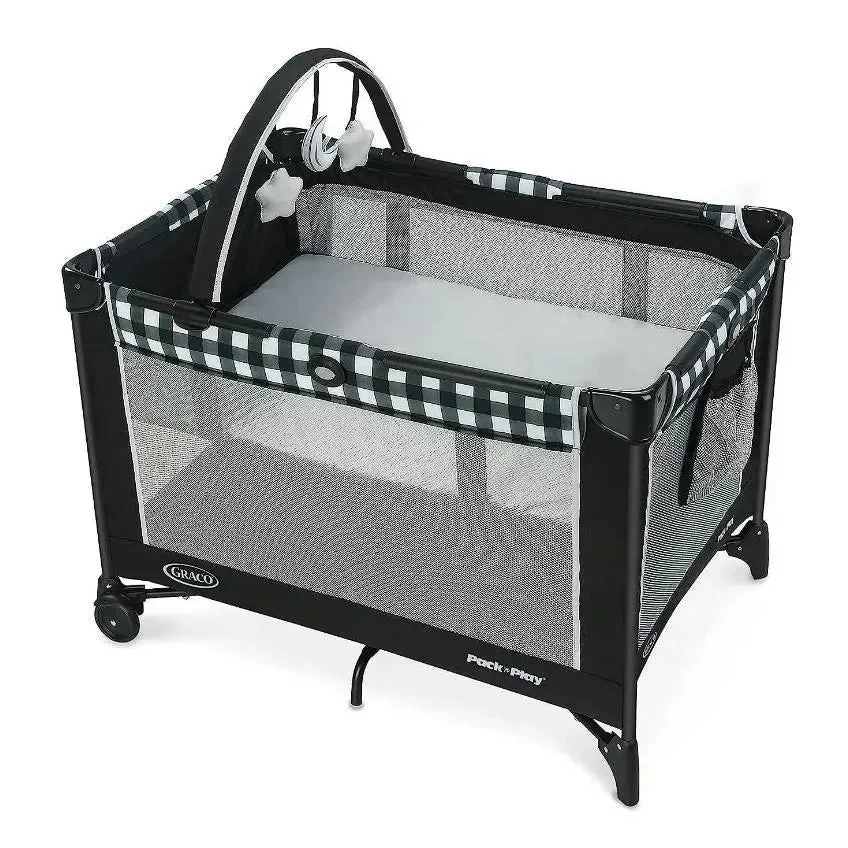 Graco Pack 'n Play On The Go Playard full setup with toy arch on white background