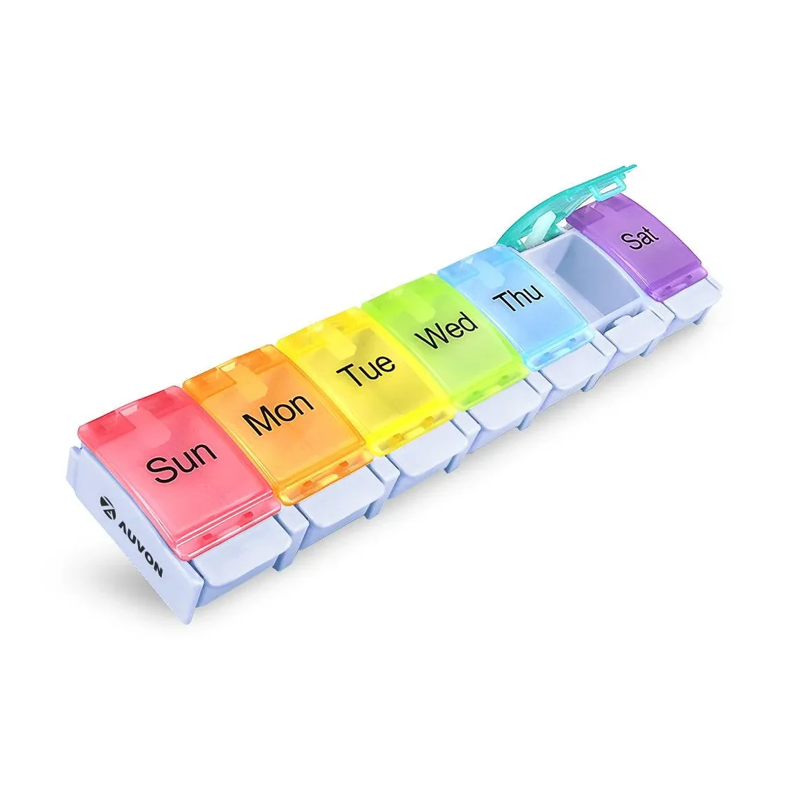 Woman seated at home using the AUVON weekly pill organizer beside a glass of water