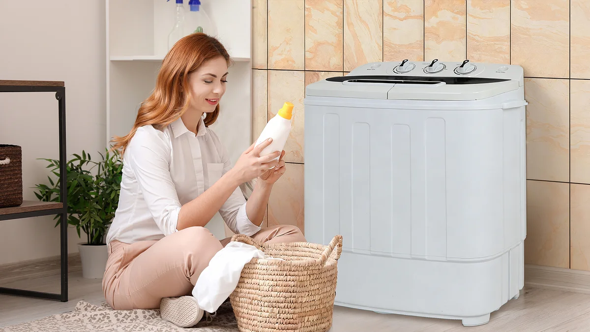SUPER DEAL Twin Tub Washing Machine in a laundry room setting with woman holding detergent bottle