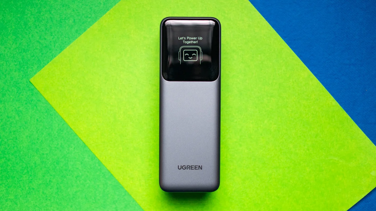 UGREEN Nexode 200W power bank lying flat showing TFT display animation