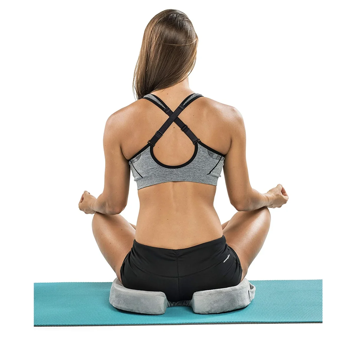 Person using ComfiLife Gel Enhanced Seat Cushion for floor meditation seating