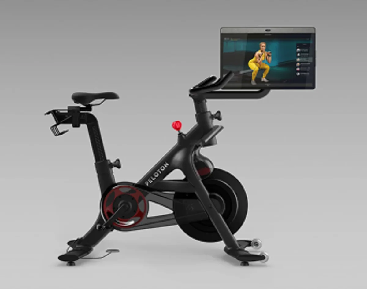 Peloton Bike rear-left angle showing screen and full bike frame