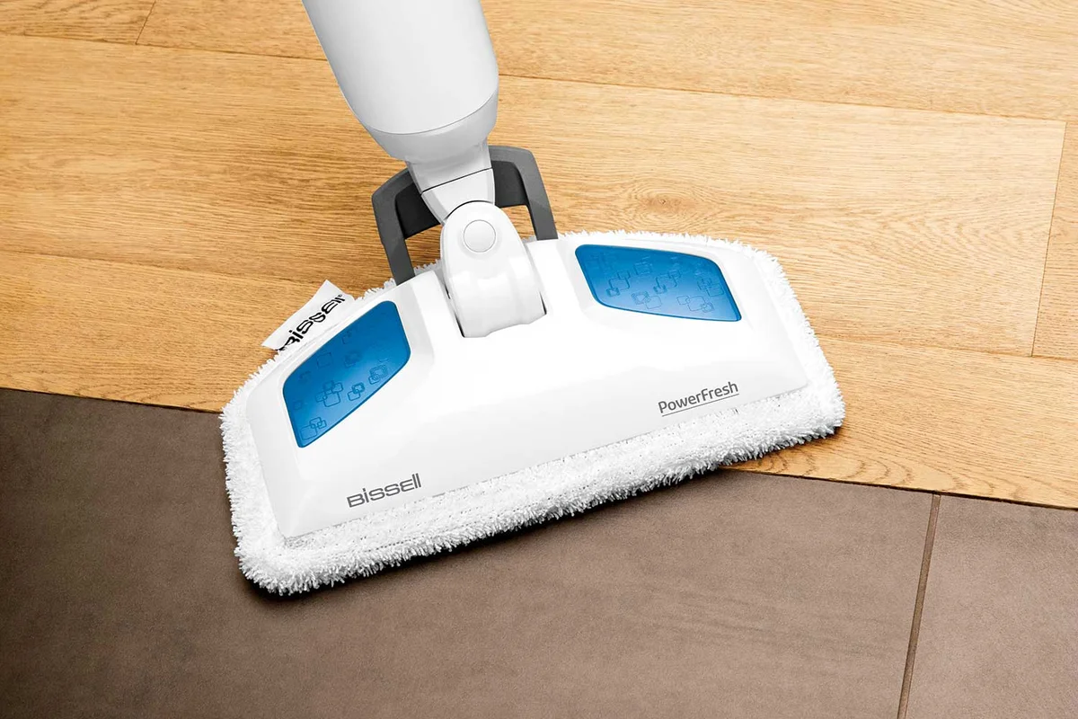 Bissell PowerFresh mop head cleaning a sealed tile and hardwood floor transition