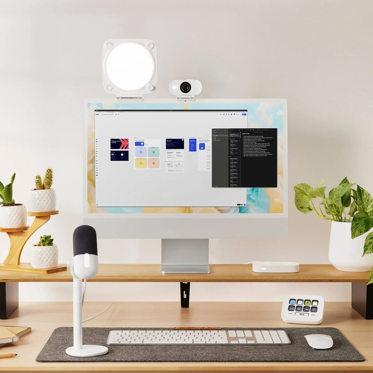 Elgato Stream Deck Neo on a bright office workspace desk beside a keyboard and monitor