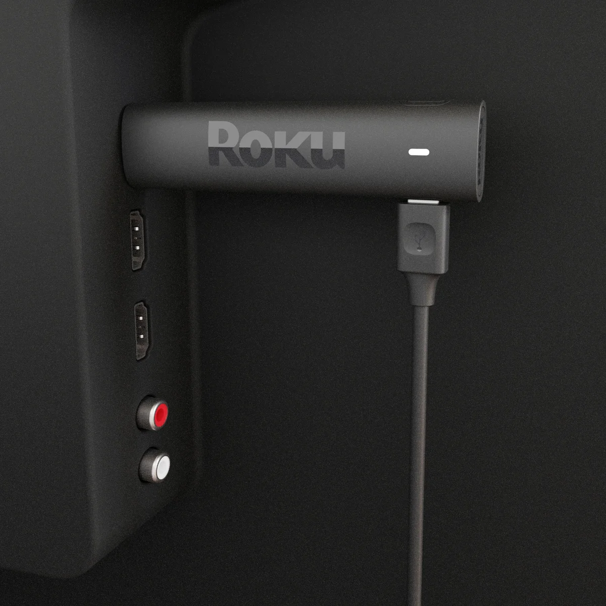Roku Streaming Stick 4K plugged into TV HDMI port showing behind-TV installation