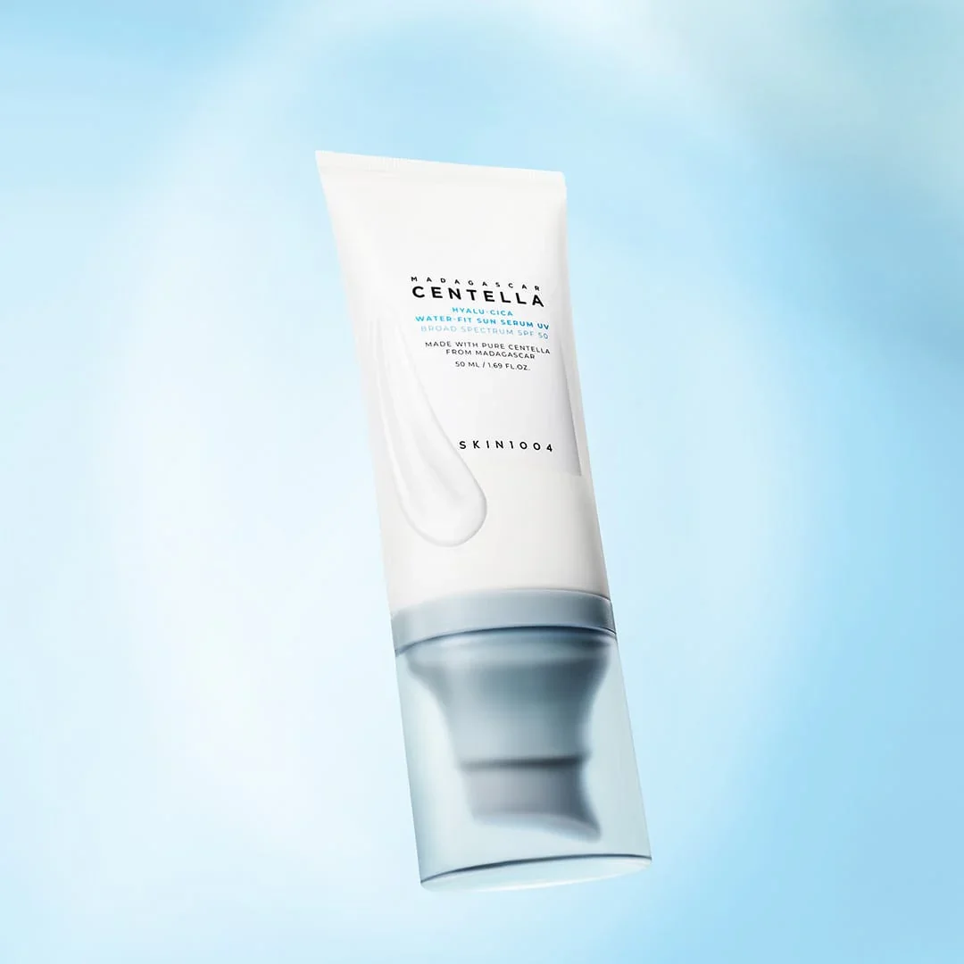 Skin1004 Sun Serum tube with serum swatch on light blue background