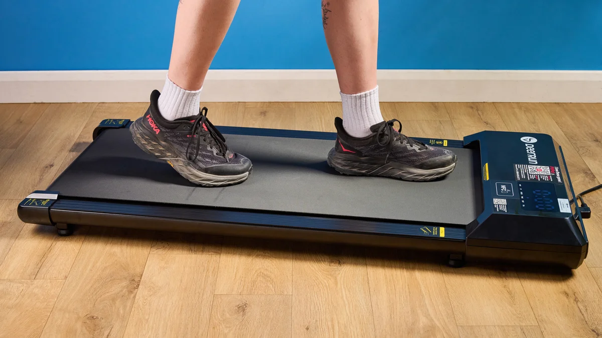 DeerRun Q1 Mini treadmill in use with person walking on belt