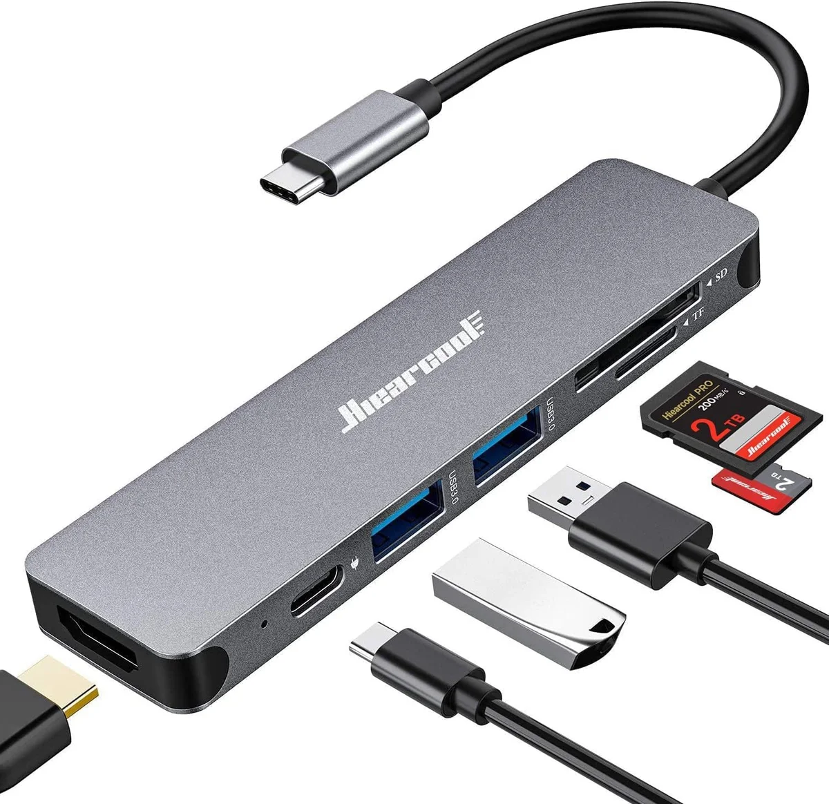 Hiearcool USB-C Hub (7-in-1) in space gray, showing the HDMI port, dual USB 3.0 ports, USB-C passthrough, and SD/microSD card slots alongside the USB-C cable and included accessories