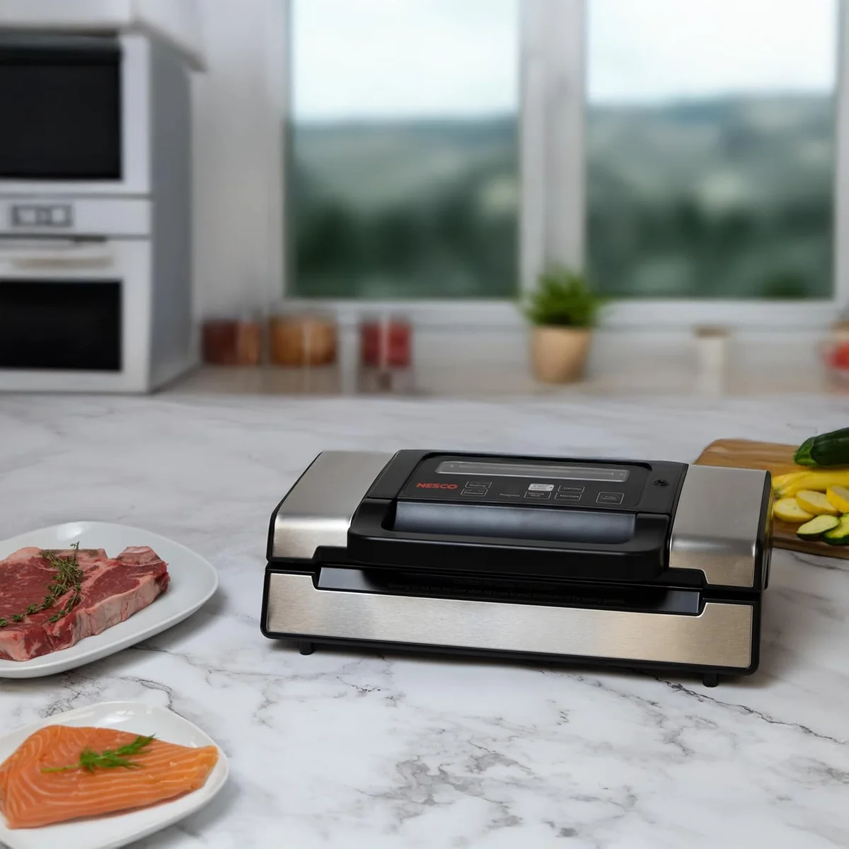 Nesco VS-12 vacuum sealer on a marble kitchen countertop with fresh steak and salmon nearby
