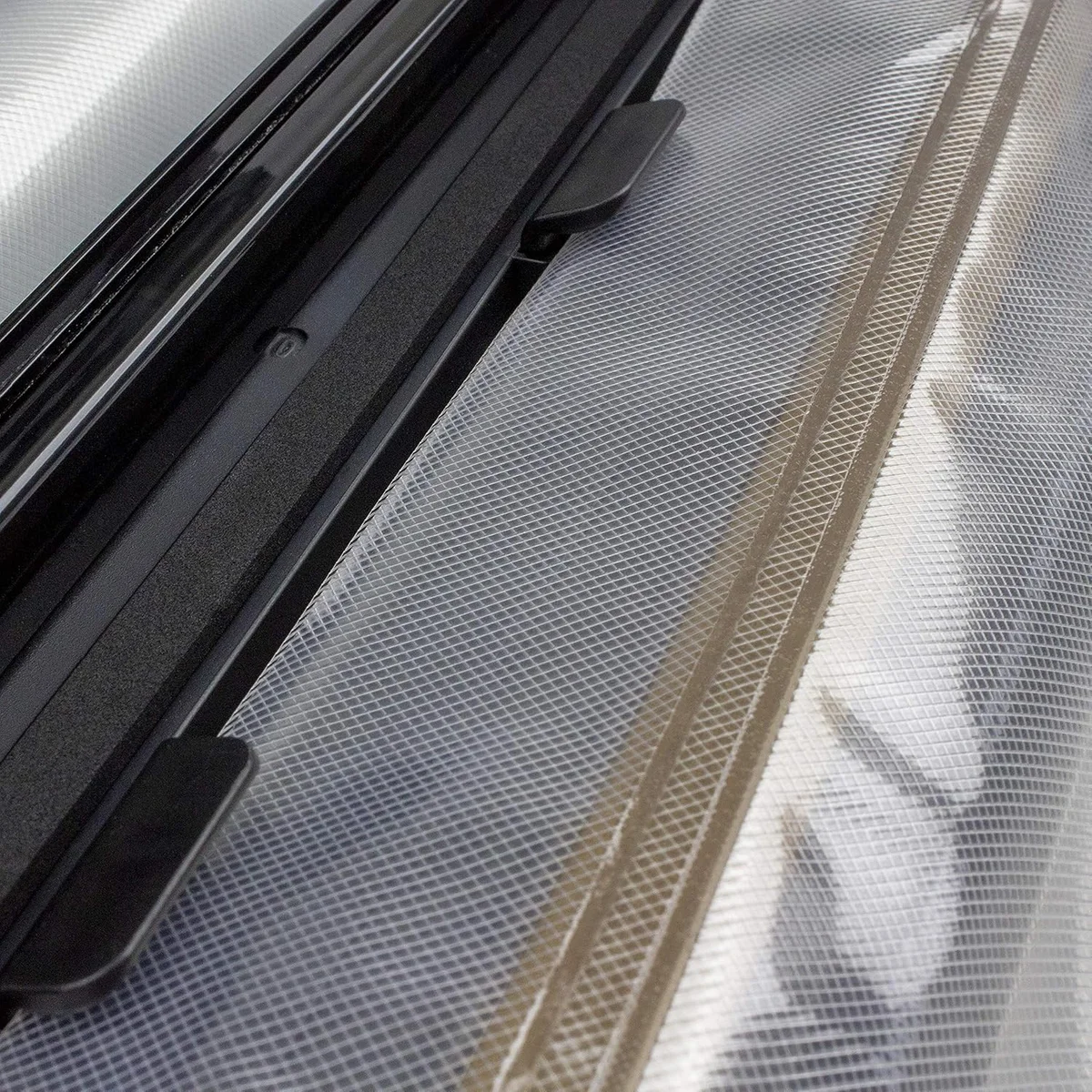Close-up of the Nesco VS-12 sealing strip and vacuum bag channel showing the double heat seal