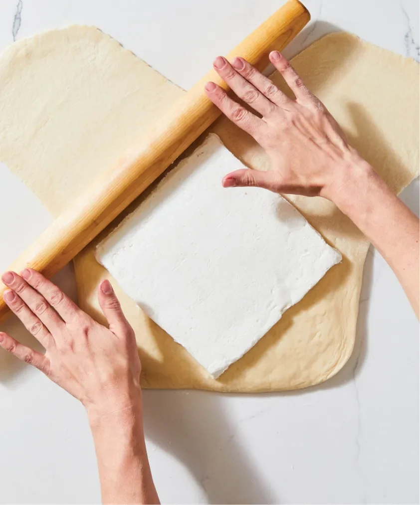 Miyoko's Creamery vegan butter being rolled into pastry dough for baking