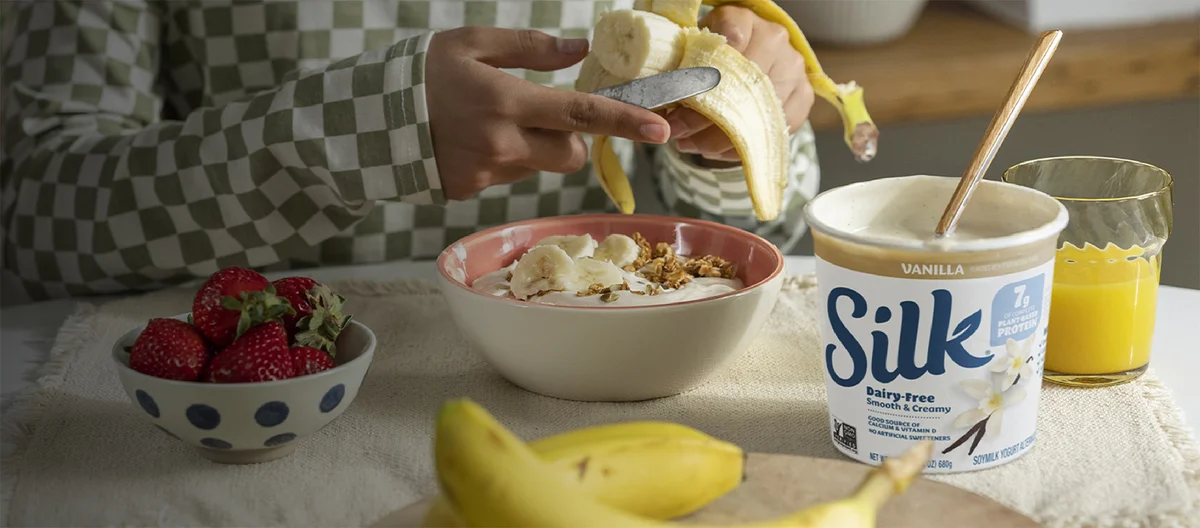 Silk Dairy-Free Soymilk Yogurt used in a breakfast bowl with banana and granola