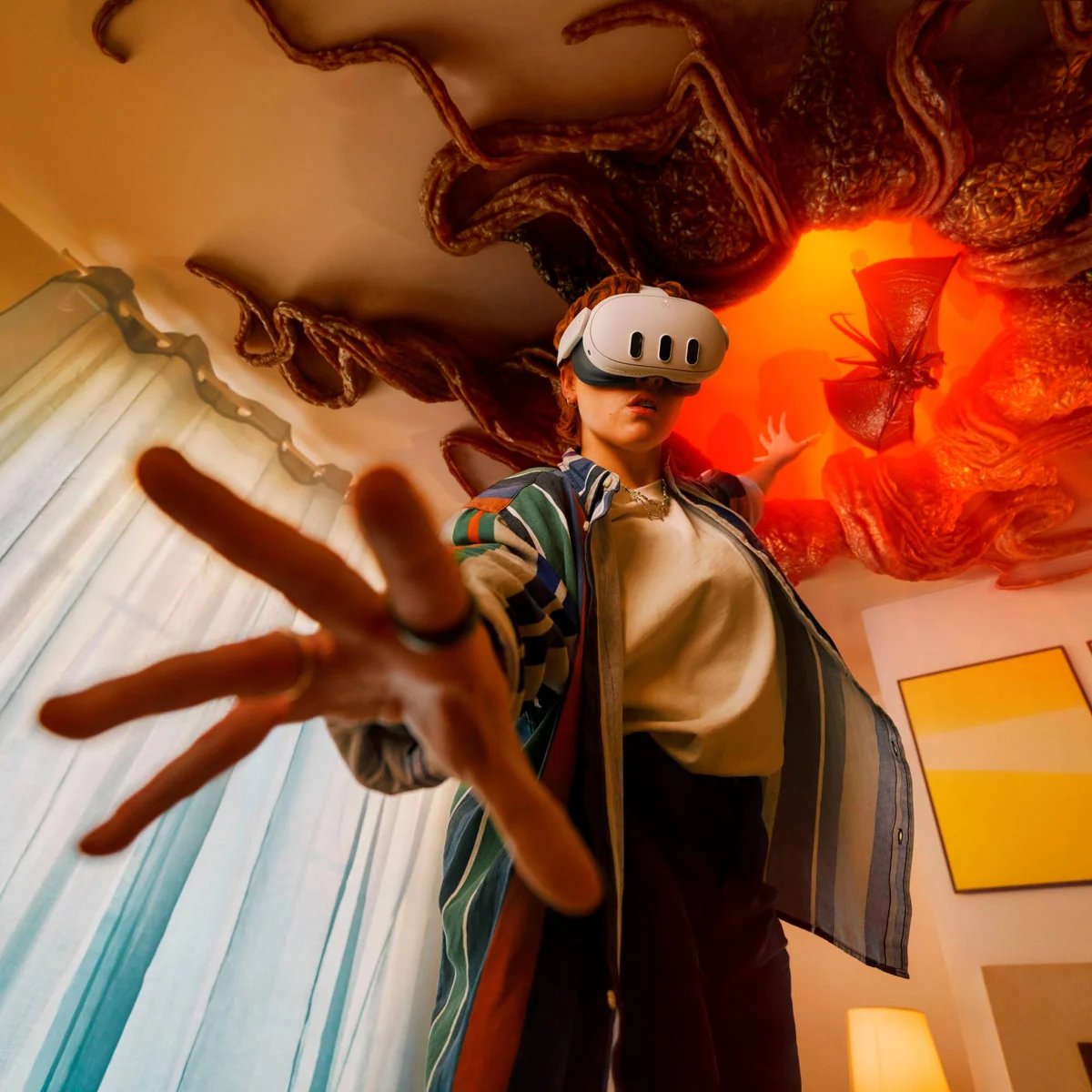 Person wearing Meta Quest 3 experiencing vivid mixed-reality game environment