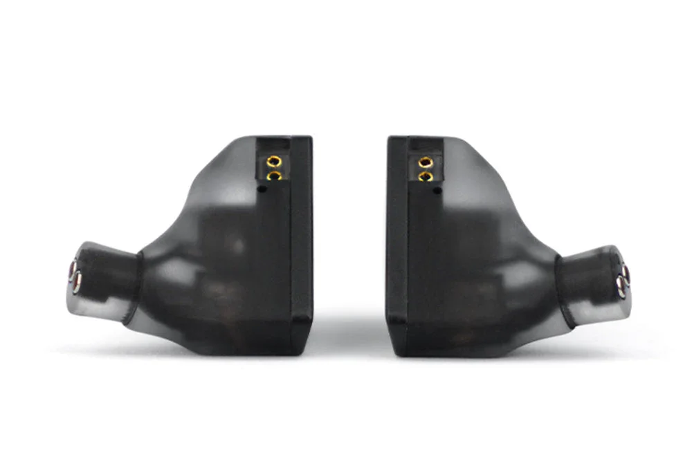 Truthear Hexa earpieces at an angle showing translucent smoke resin shells and 2-pin connectors