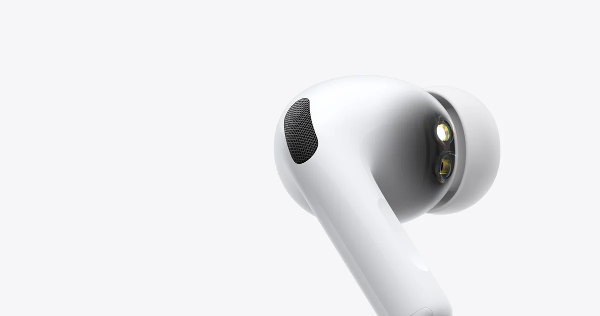 Apple AirPods Pro 3 close-up of heart rate sensor and microphone mesh